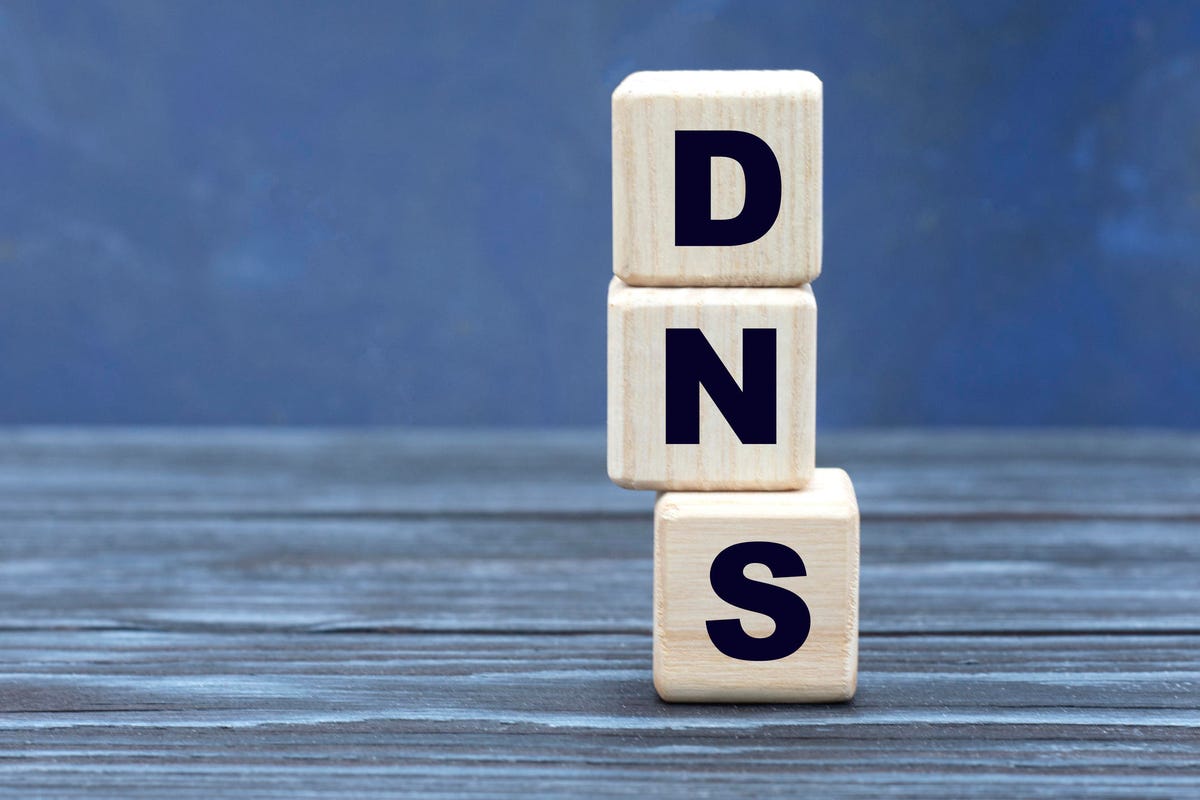 concept word DNS on cubes on a beautiful gray blue background