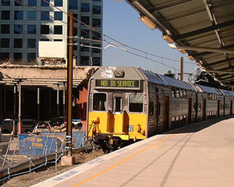A Sydney train pulling in displaying no service on its screen