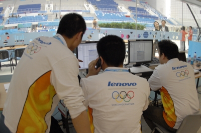 Lenovo technicians test equipment at the Beijing National Aquatics Center