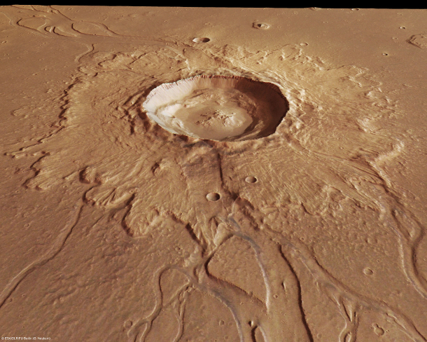 The surface of Mars taken by the Mars Express orbiter in 2007. It shows the Hephaestus Fossae region, which is dotted with craters and channel systems