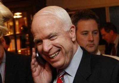 John McCain on cell phone