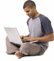 man-sitting-laptop-floor-no-shoes-zaw2.png