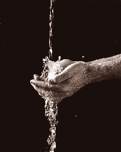 Water Running Through Hands