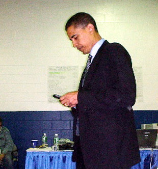 Obama wit his Blackberry