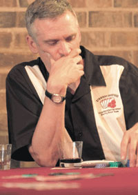 Chris Gladwin playing poker, from the Cleversafe Web site, and CrainÂ’s Chicago Business