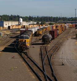 Two trains merging in Portland, Oregon, from This Space for Rent