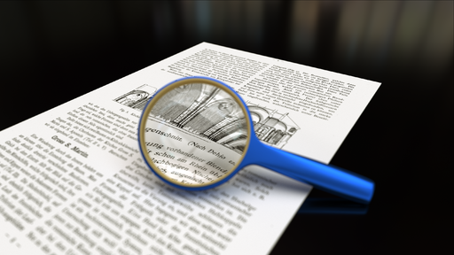 Magnifying_glass_with_focus_on_paper