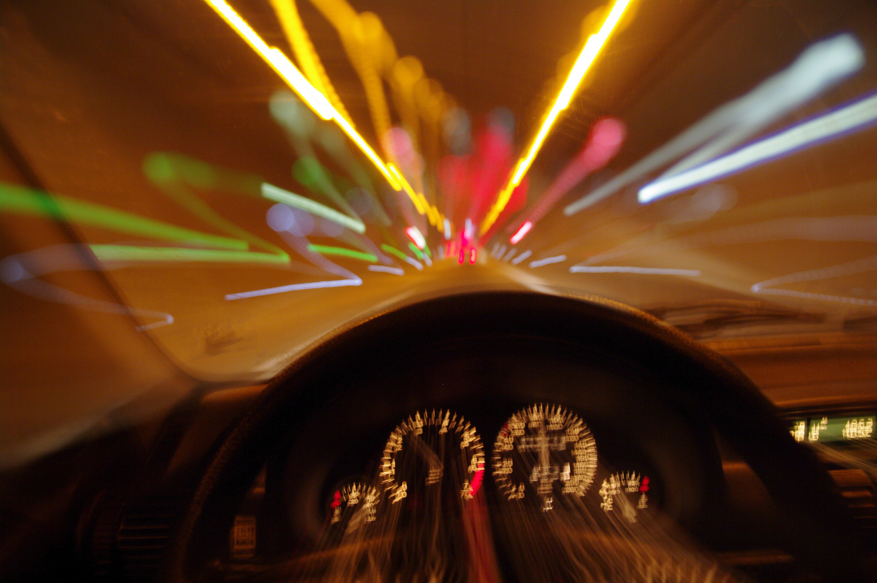 blurred-motion-car-drivers-view-traveling-through-tunnel.jpg