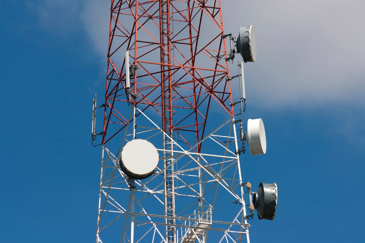 Telecommunication tower under blue sky