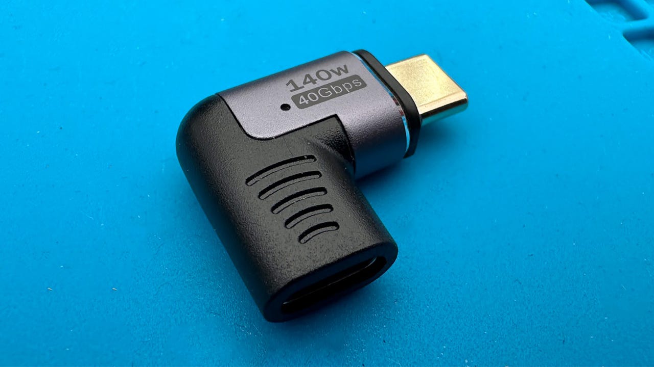 A magnetic breakaway USB-C connector on a blue background