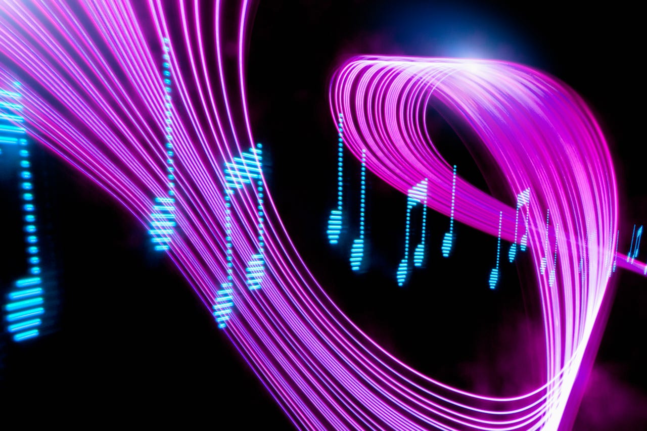 Music notes flowing through sound wave