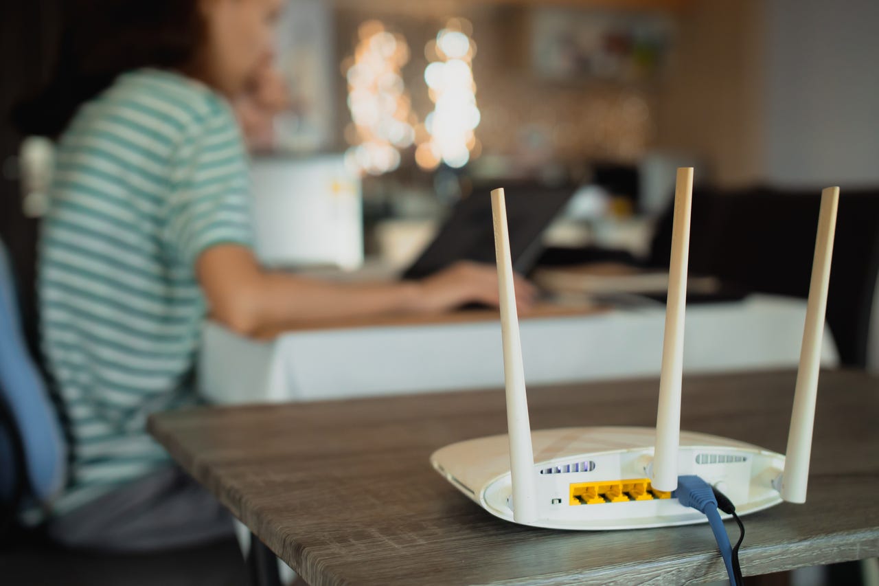 woman working near router