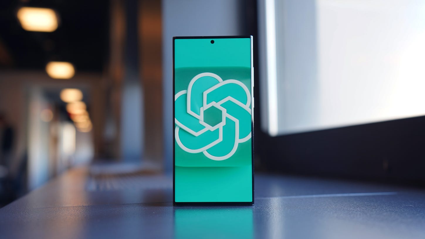 A phone displaying the OpenAI logo
