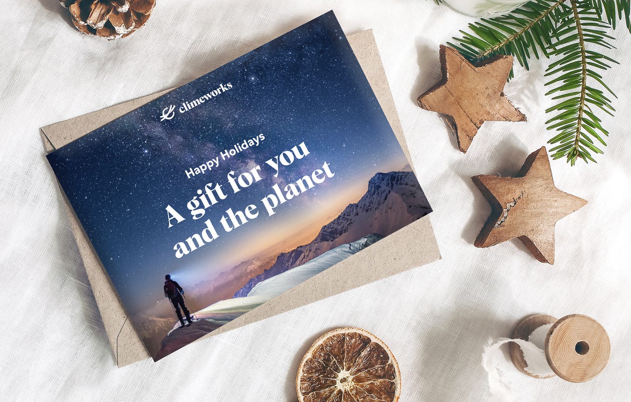 Climeworks gift card surrounded by holiday decorations