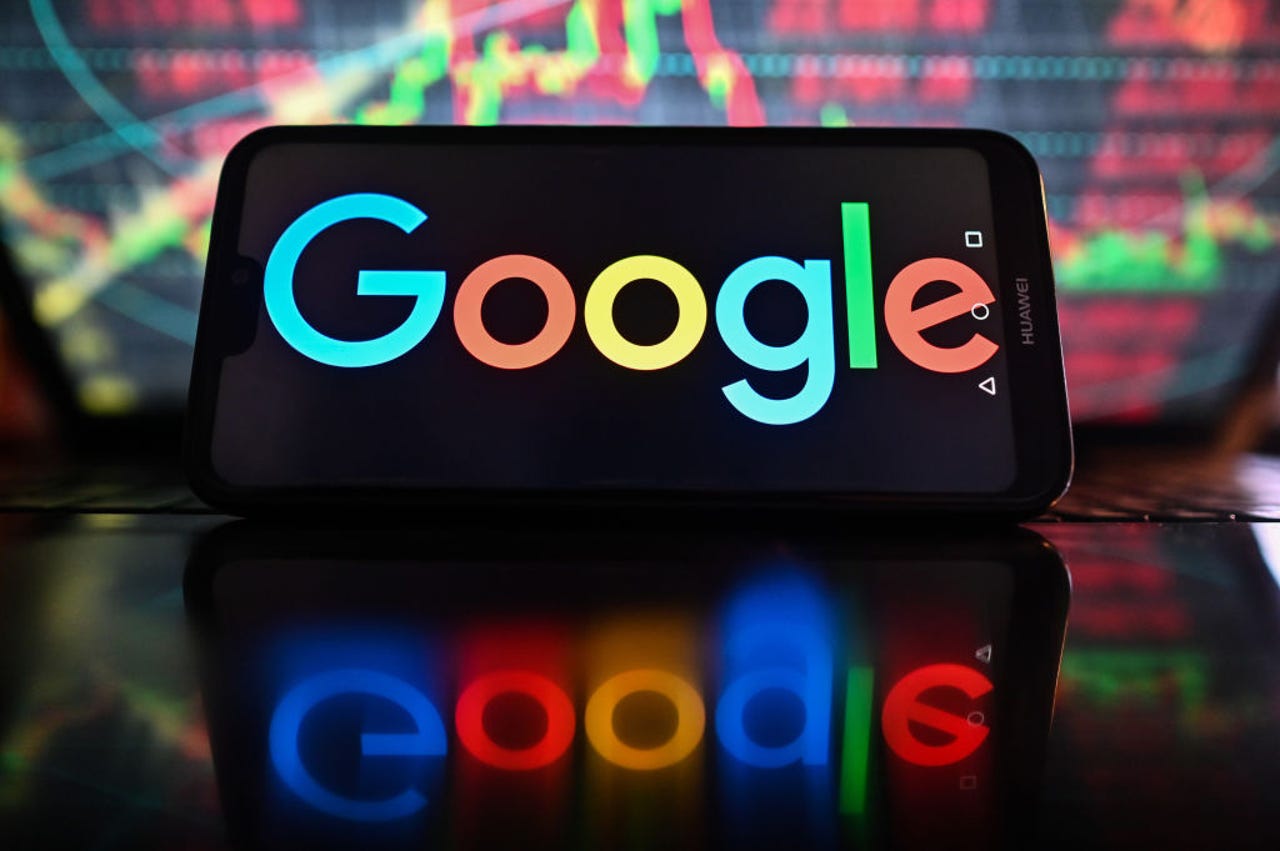 Google logo on smartphone with colorful background