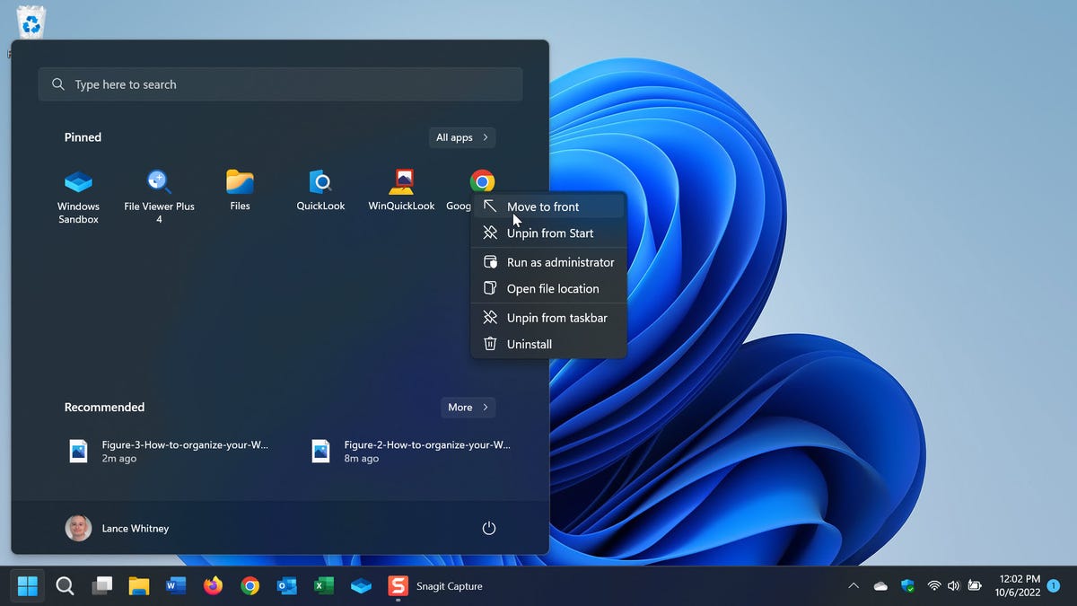 Moving icons to the top row in Windows 11 Start menu.