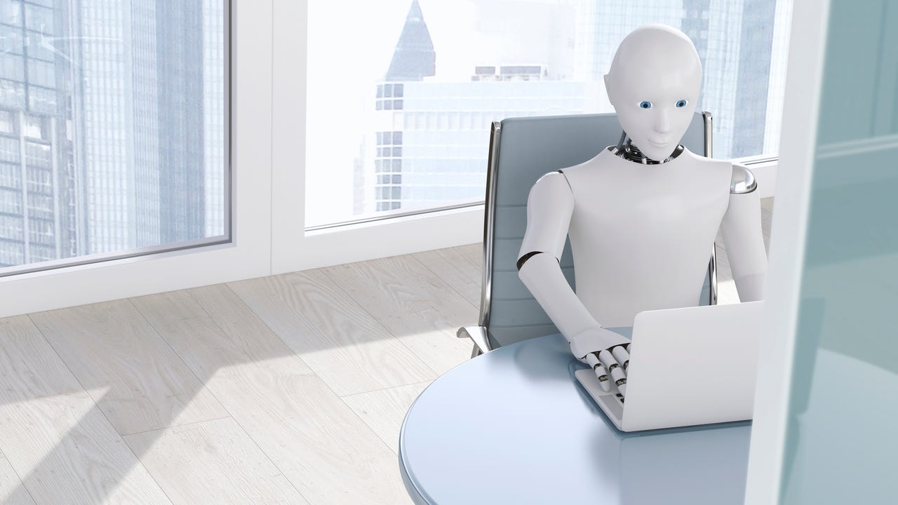AI robot working on laptop