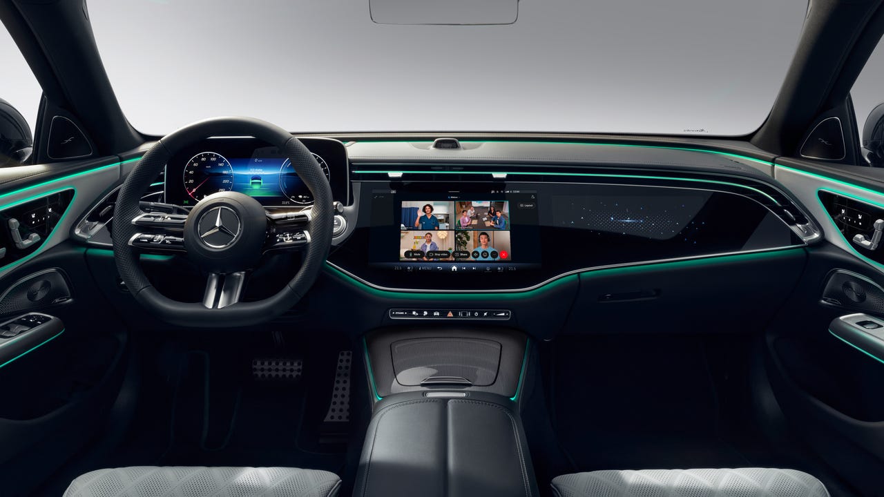 Interior of a Mercedes, displaying Webex on the dashboard