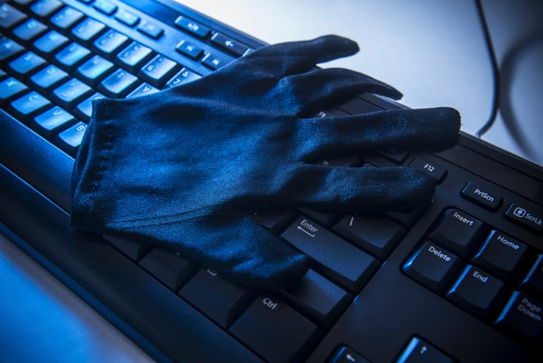 Black glove keyboard hacker