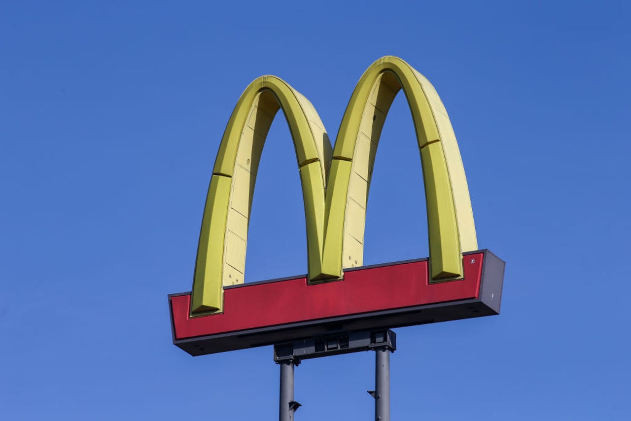 McDonald's logo against sky background