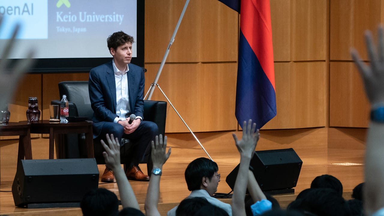 TOKYO, JAPAN - JUNE 12: Students raise their hands for a question as OpenAI Chief Executive Officer Sam Altman looks on during an event at Keio University on June 12, 2023 in Tokyo, Japan. Altman discussed with students at the event hosted by one of Japan's leading private universities as he expressed his intentions to open an office and broaden services in the country. (Photo by Tomohiro Ohsumi/Getty Images)