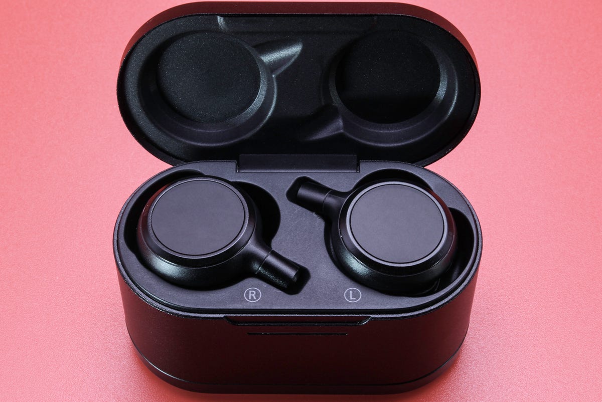 Drop + Grell earbuds with charging case open