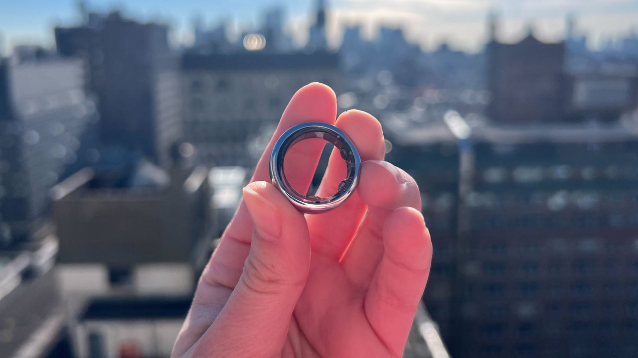 Oura Horizon Ring against skyline