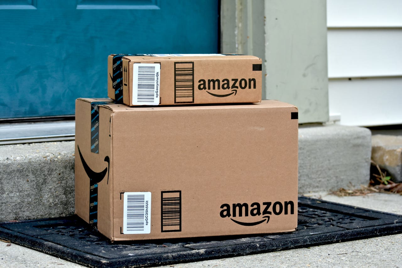 Amazon boxes sitting on a porch