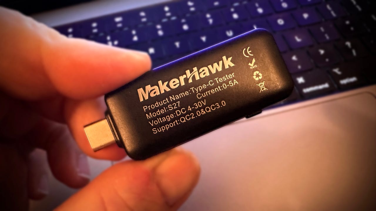 Hand holding MakerHawk Type-C USB-C meter tester
