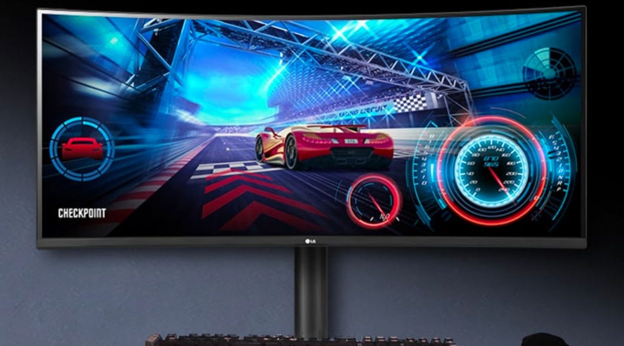 LG curved monitor showing a racing game