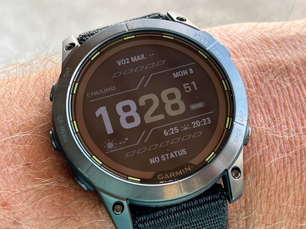 Garmin Enduro 2 smartwatch on a wrist showing fitness info