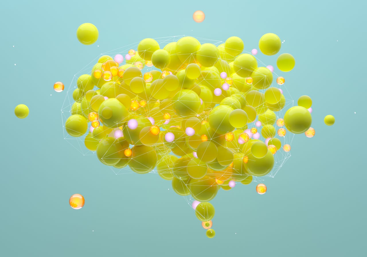 cerebro hecho de globos amarillos