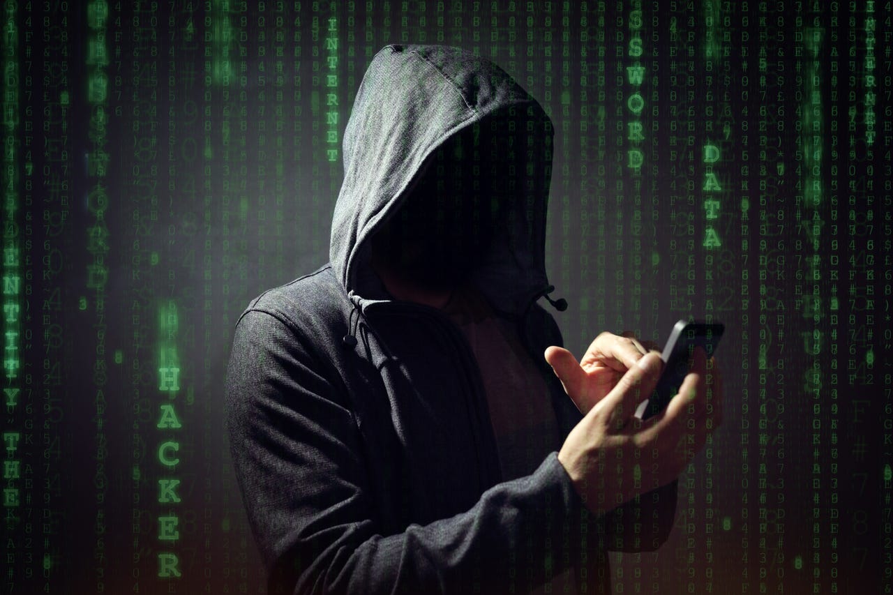 hacker-using-phone.jpg