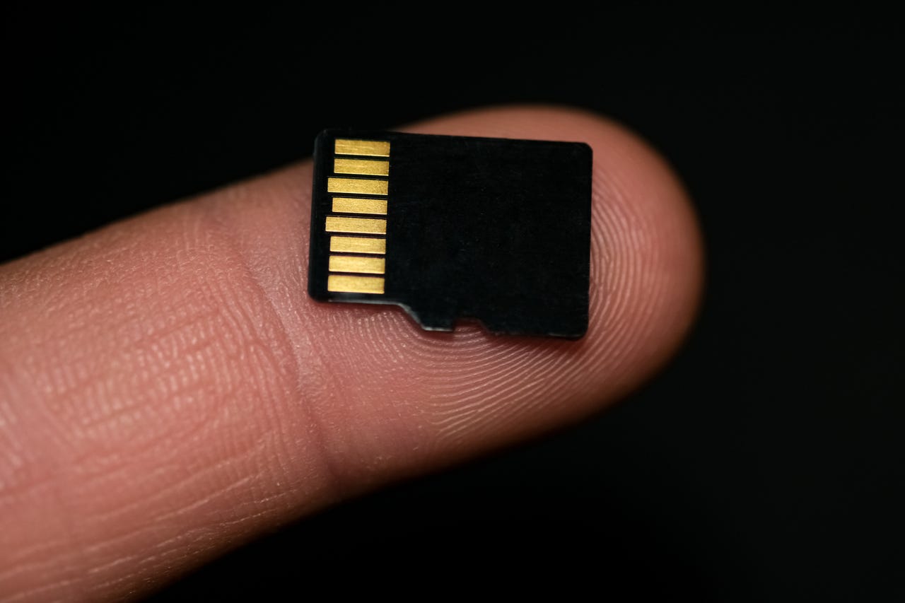 MicroSD card on finger