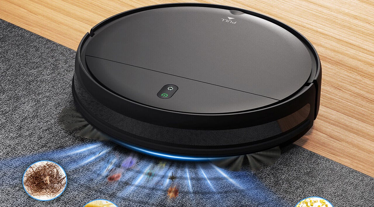 Close-up of an Onson 2-in-1 robot vacuum cleaning both hardwood and carpet