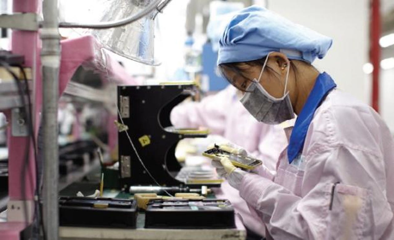 apple foxconn workers transparency report underage fired supplier