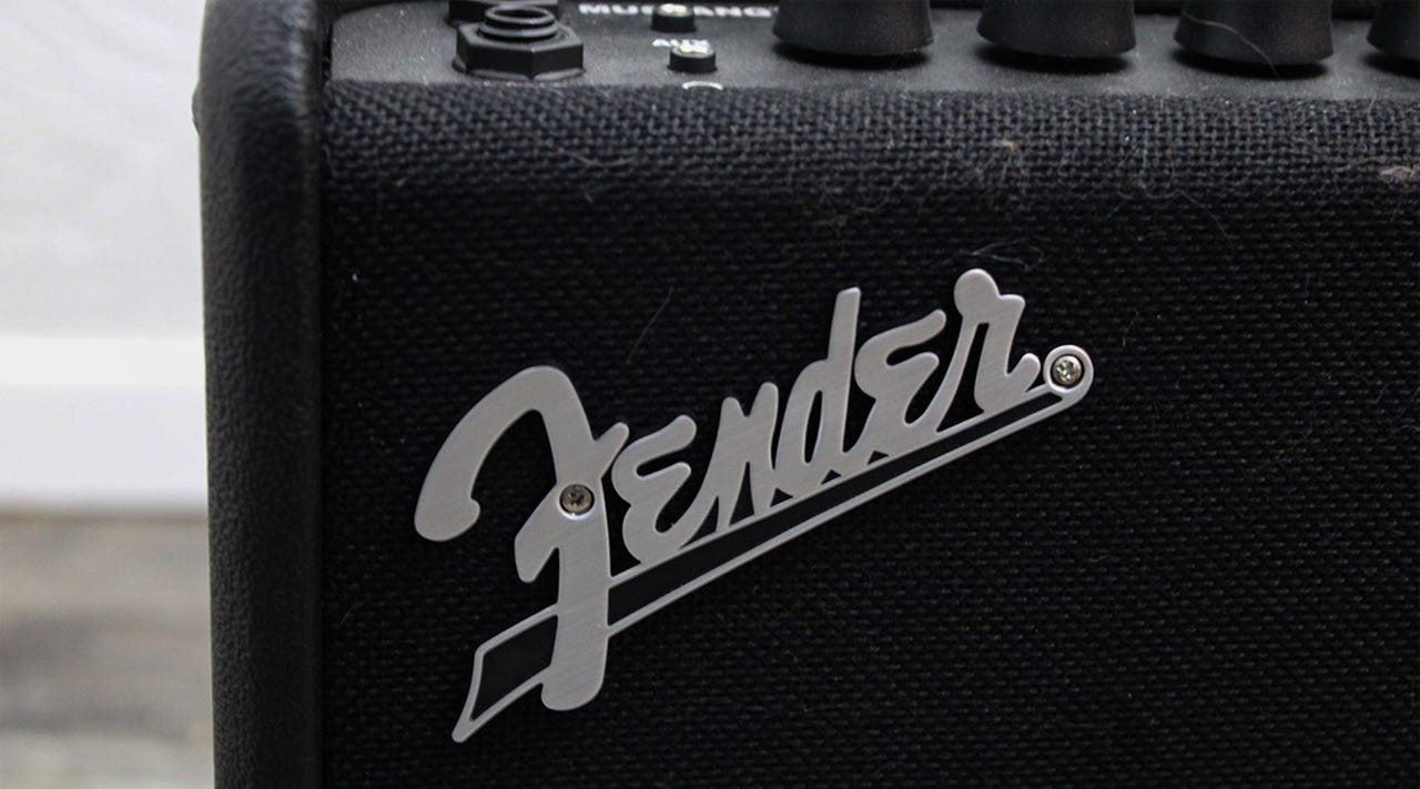 A closeup of the Fender logo on a Mustang LT25 practice amp