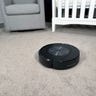 Roomba Combo j7+ vacuuming on carpet.