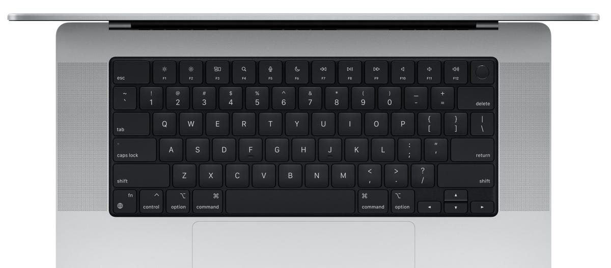 The Touch Bar is gone, replaced by physical keys