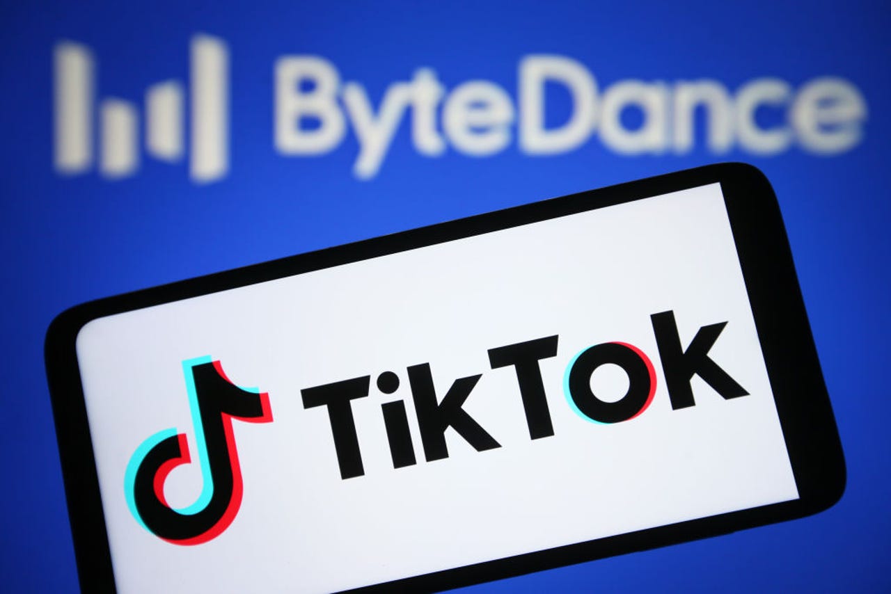TikTok logo on phone with ByteDance logo in background