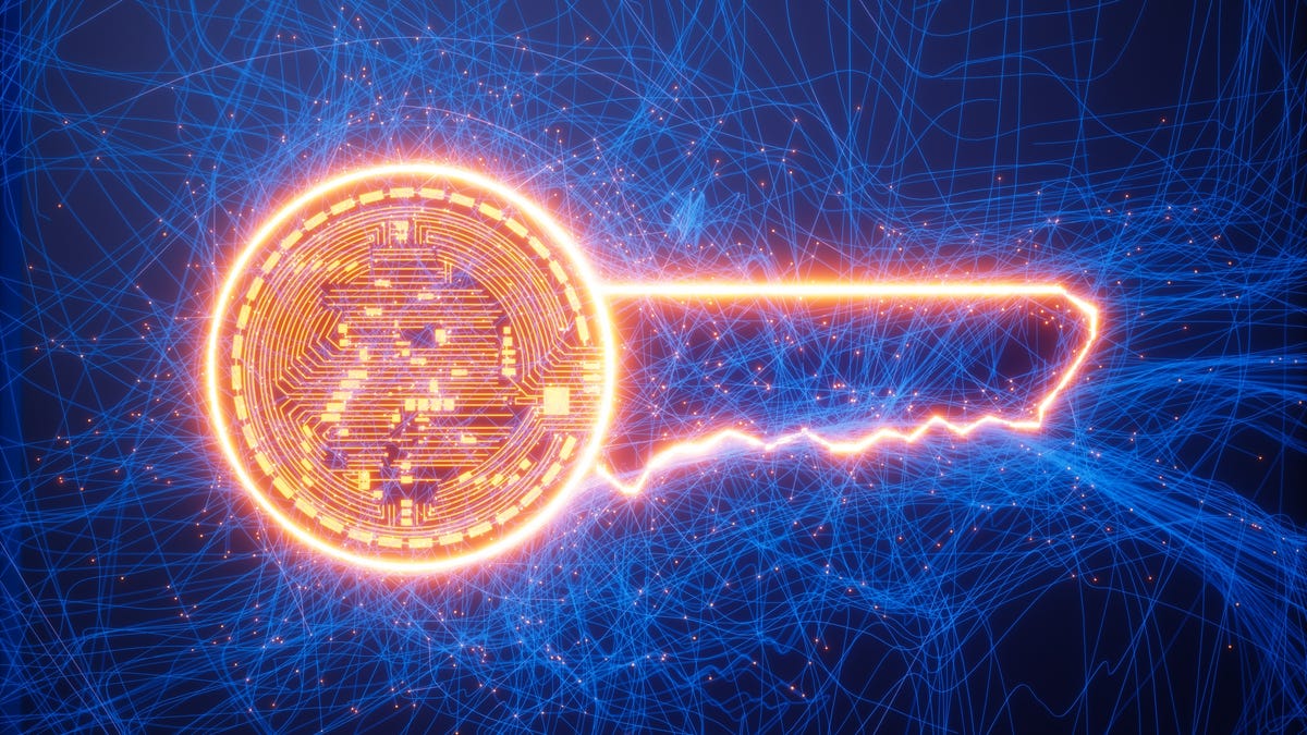 Bitcoin with bright key on blue background