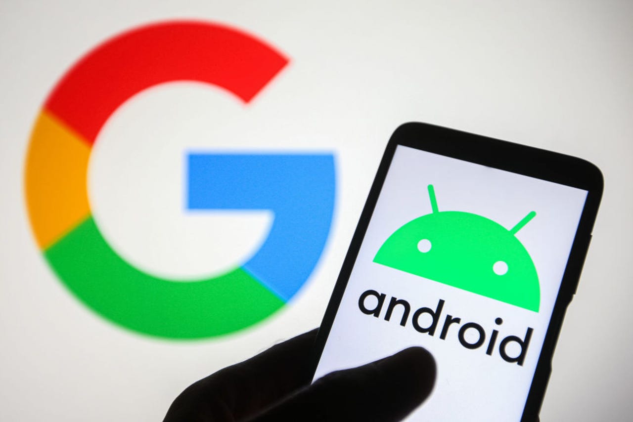 android-logo-on-a-smartphone-in-front-of-a-google-logo