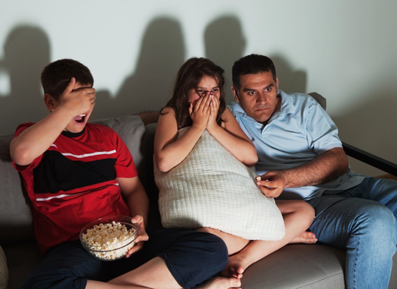 scared-family-watching-tv-thumb.jpg