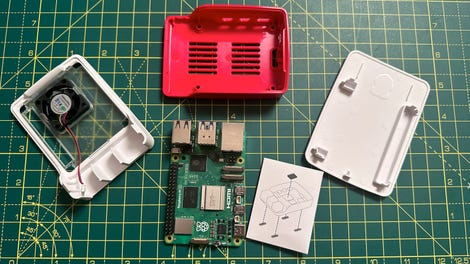 Everything that comes with the official Raspberry Pi 5 case, and a Raspberry Pi 5.
