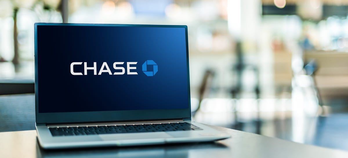 Laptop open with Chase Bank logo.