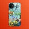 A phone case with sea animals swimming set against an orange background