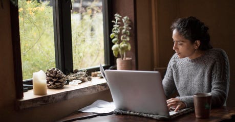 getty-woman-using-a-laptop-while-working-from-home.jpg