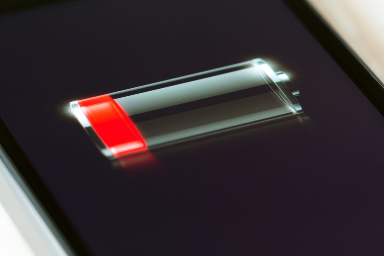 iPhone showing battery with red stripe