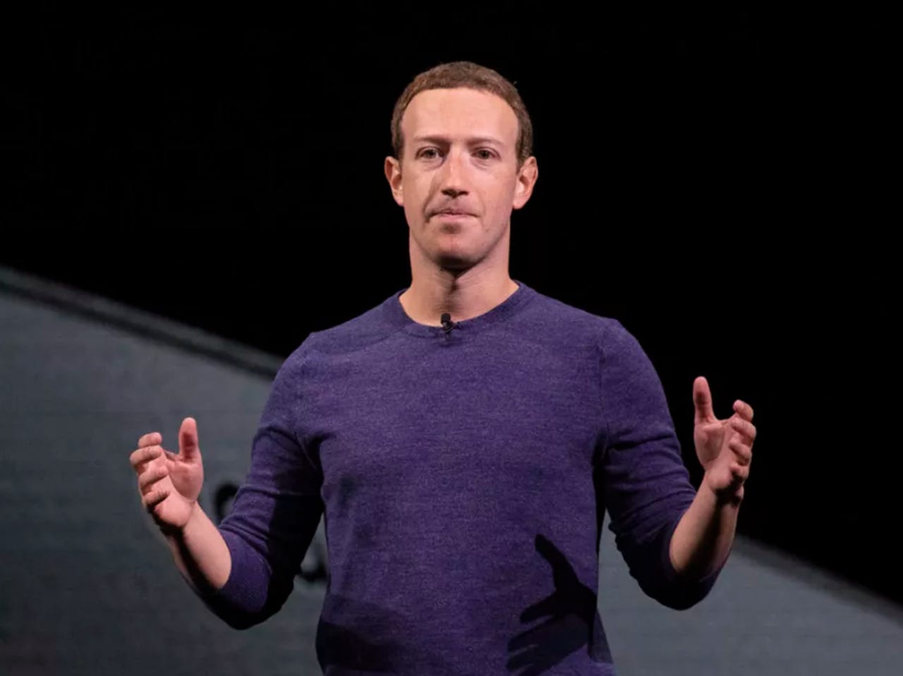 zuckerberg-hands-outstretched.png
