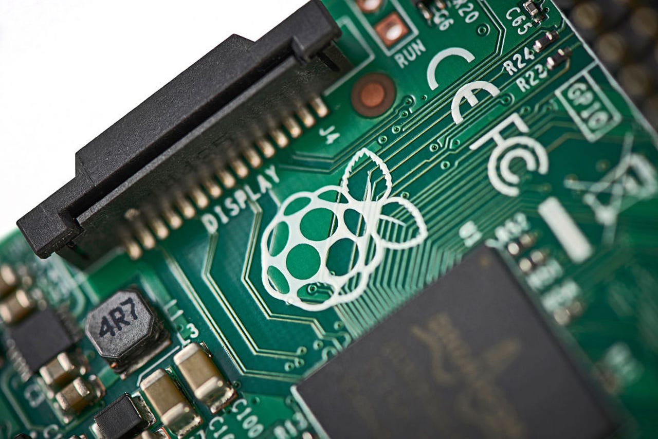 Close-up detail of the Raspberry Pi Foundation logo on a Raspberry Pi 2 Model B